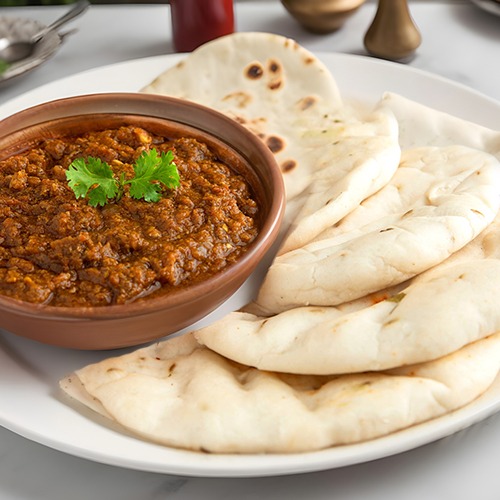 11 Keema Kulcha (Mutton) with Gravy